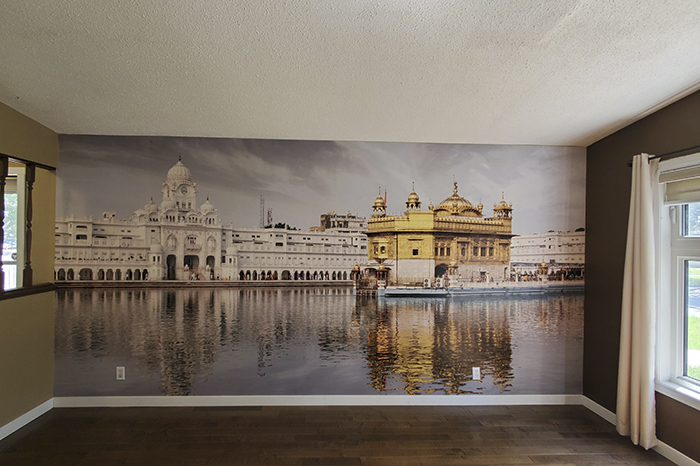 golden temple wallpaper in the living room